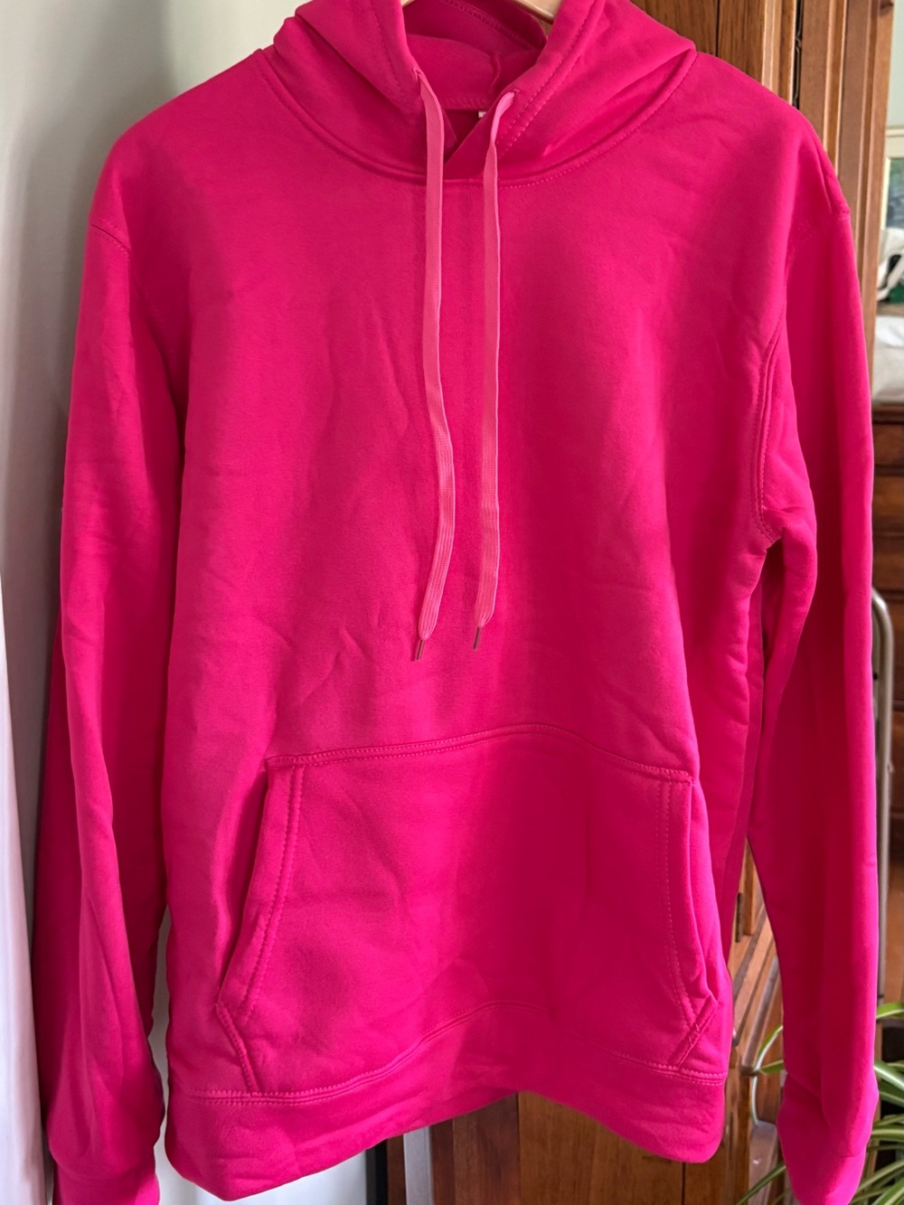 Women's Hot Pink Hooded Pullover Sweatshirt and Matching pants.